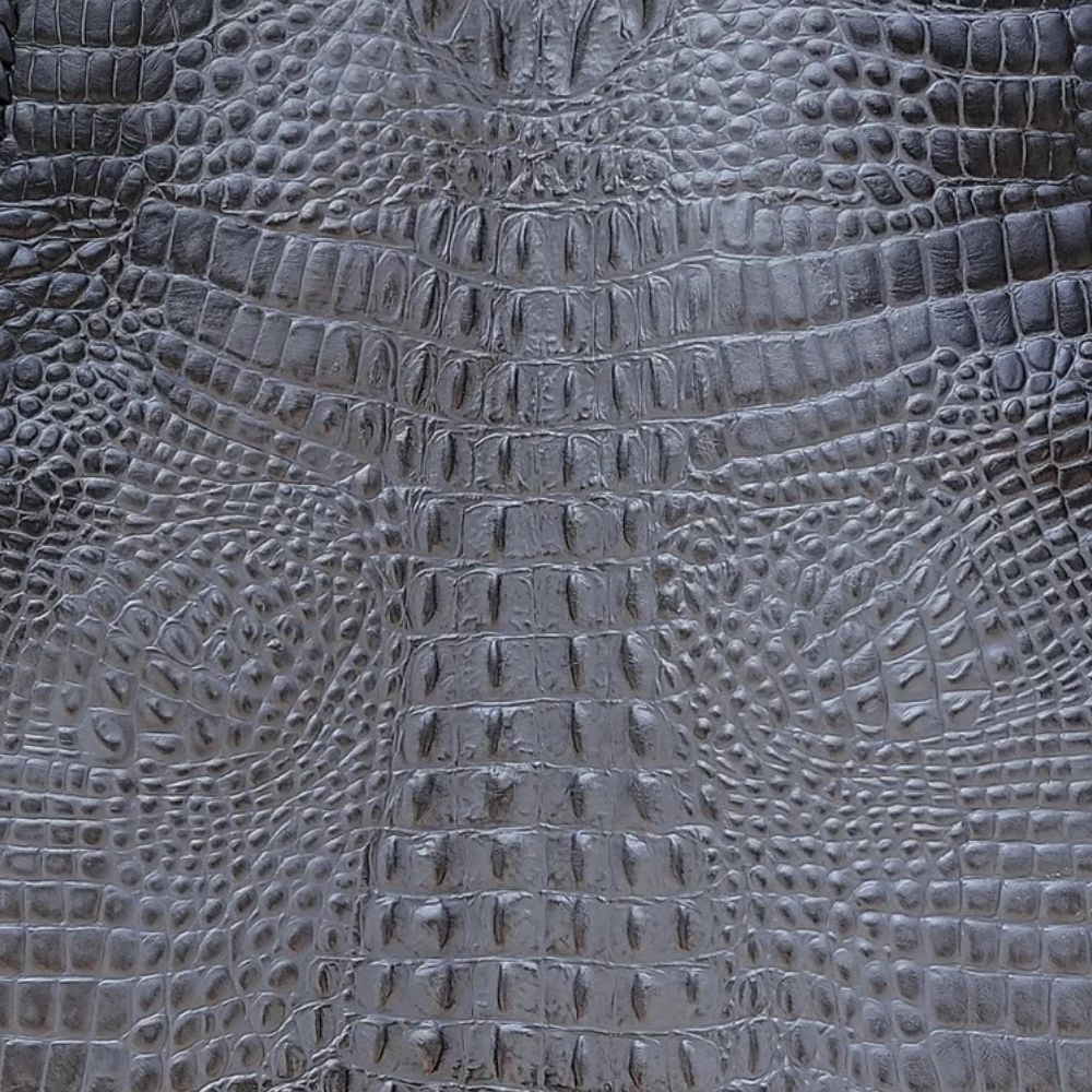Gray cowhide leather biker vest with unique crocodile embossing, perfect for riders.