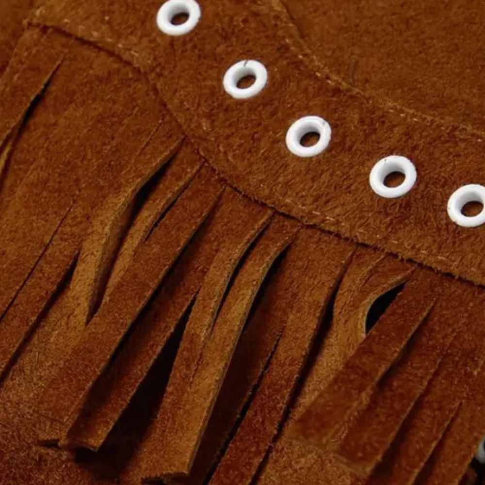 Elevate your western style with this suede cowboy leather jacket, complete with stylish fringe details for an authentic yet fashionable look.
