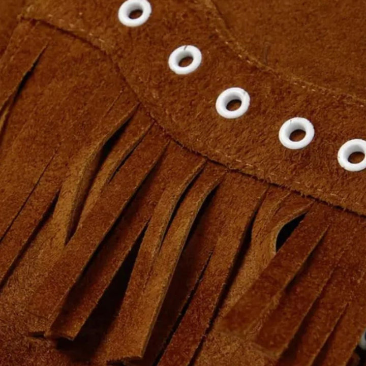 Elevate your western style with this suede cowboy leather jacket, complete with stylish fringe details for an authentic yet fashionable look.