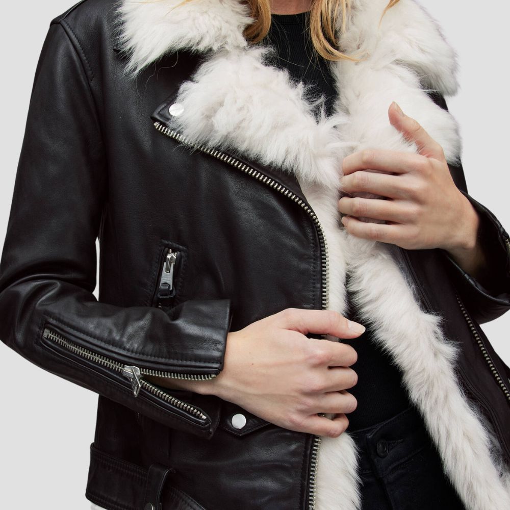 This premium fur leather jacket for women is ideal for stylish winter wear. The soft fur lining adds warmth, while the sleek leather exterior provides a sophisticated touch to your outfit.