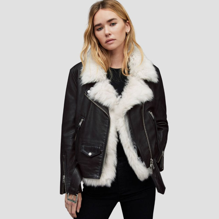 Elevate your winter wardrobe with a premium fur leather jacket for women. The combination of plush fur and high-quality leather creates a chic and cozy look perfect for winter fashion.