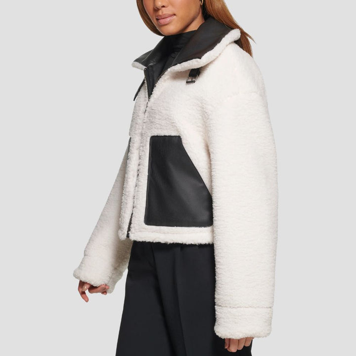Make a statement with a stylish women’s fur leather jacket for street fashion. The trendy fur details add an edgy touch to the sophisticated leather design.
