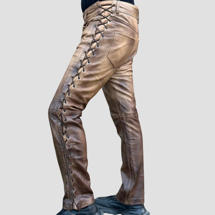 Rugged brown vintage leather pants with side laces for a classic biker look