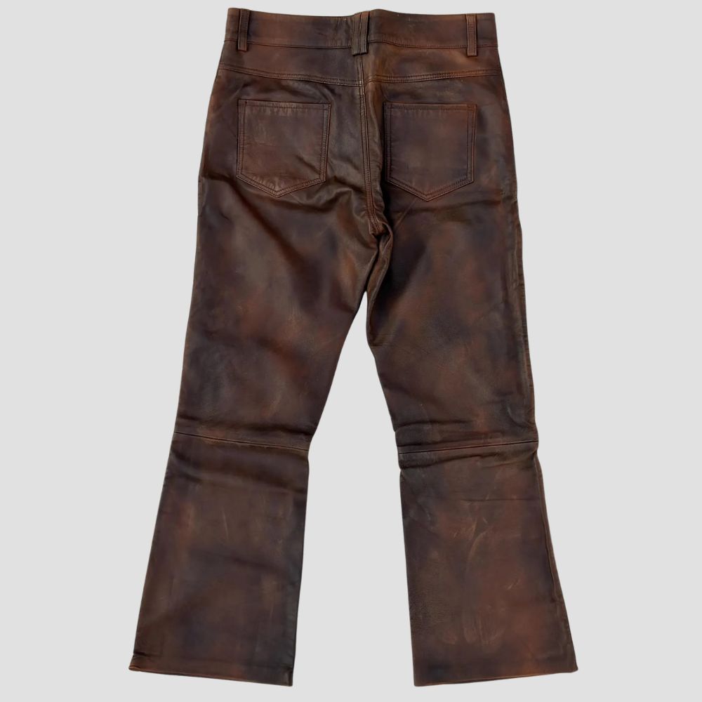Men’s vintage-style distressed leather pants, perfect for casual wear.