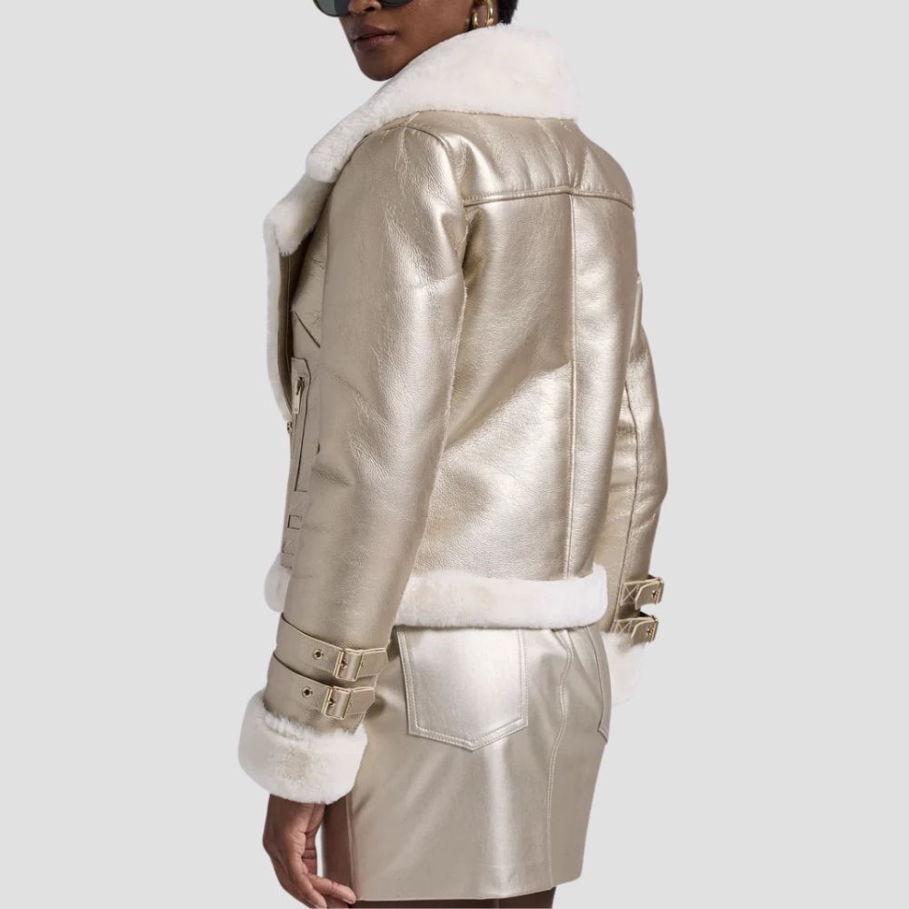 Discover a stylish winter essential with this soft-touch women’s fur leather metallic jacket. The metallic leather exterior and fur lining offer a trendy, bold winter look.