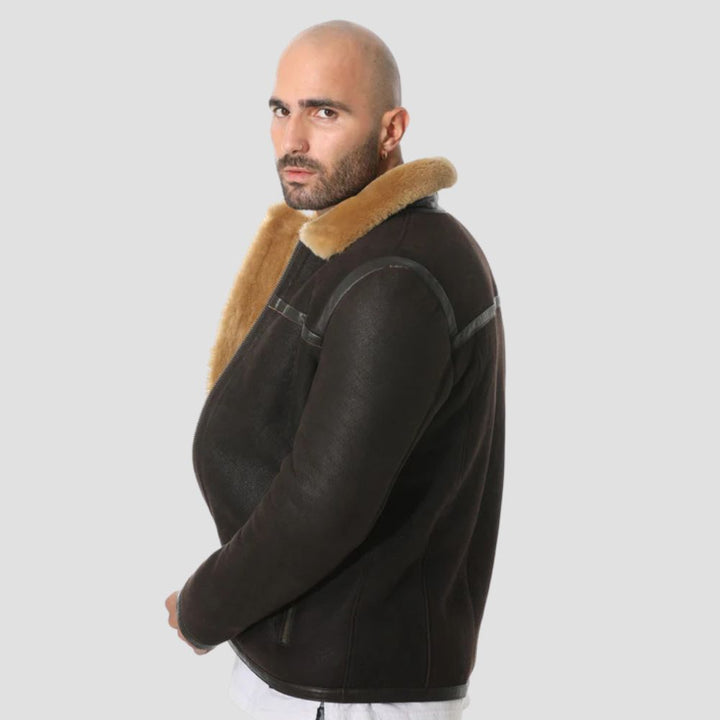 Men’s brown sheepskin leather jacket with faux shearling interior.