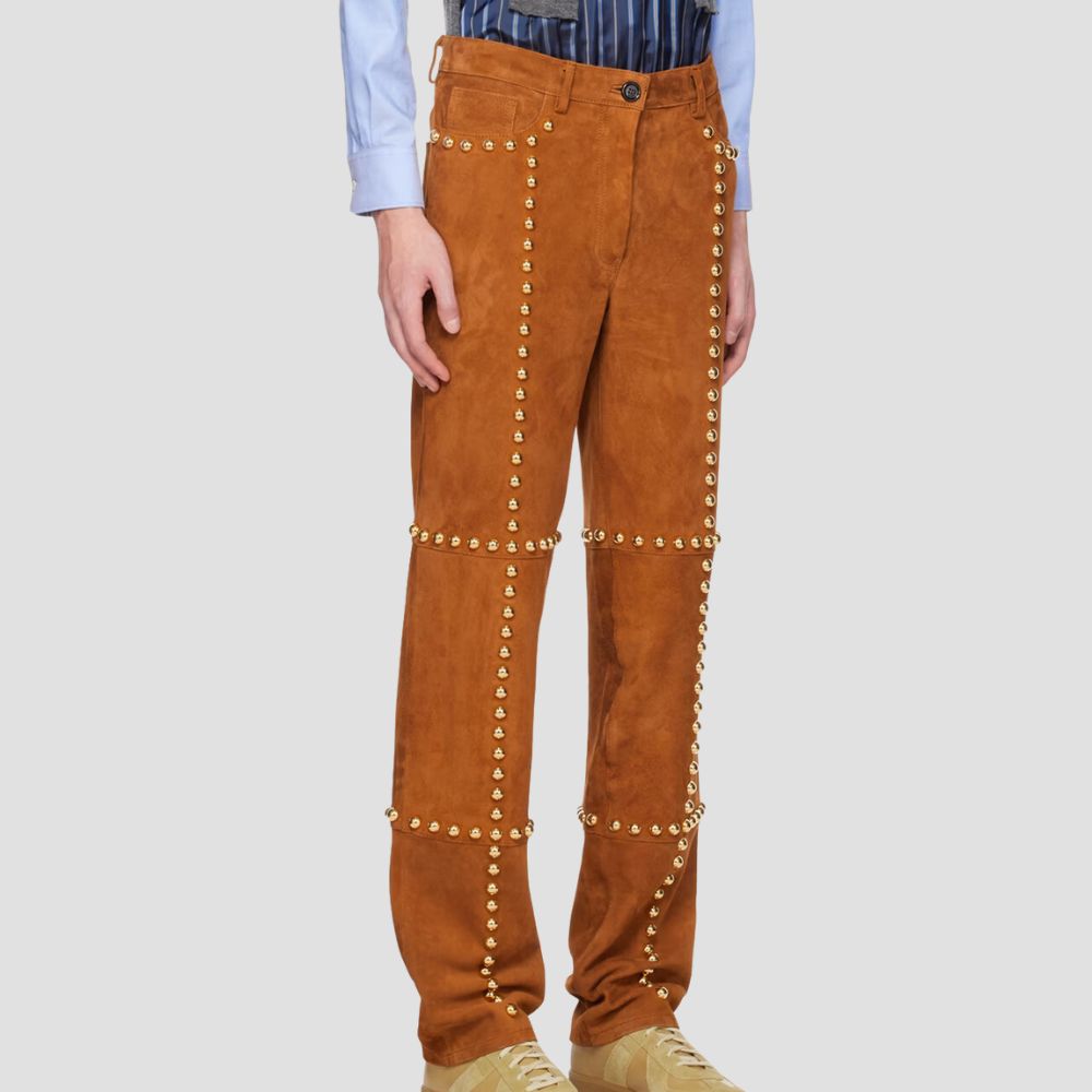 Men’s edgy studded suede leather pants, perfect for bold and unique style.