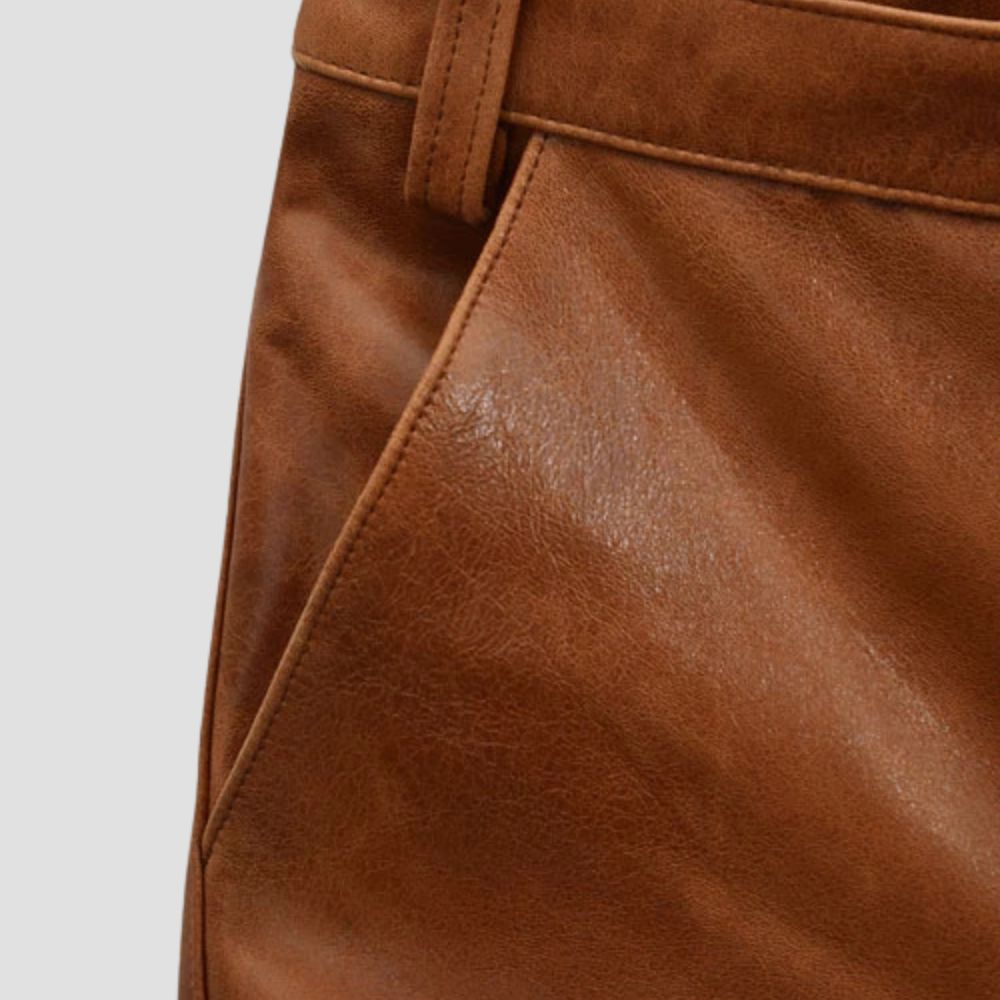 Sleek and stylish brown sheepskin leather trousers designed for modern fashion.