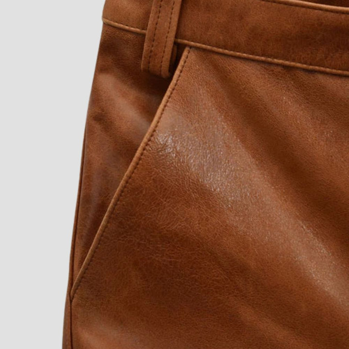 Sleek and stylish brown sheepskin leather trousers designed for modern fashion.