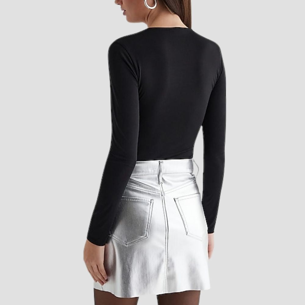 This silver metallic skirt offers an elegant, modern look for women. Perfect for adding a reflective, stylish element to your evening or day-to-night wardrobe.