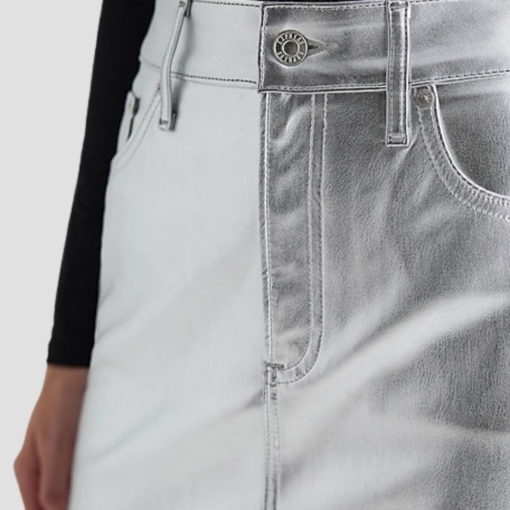  Elevate your fashion game with this elegant silver metallic skirt. Its sleek, reflective design adds a glamorous edge, perfect for both casual and dressy occasions.