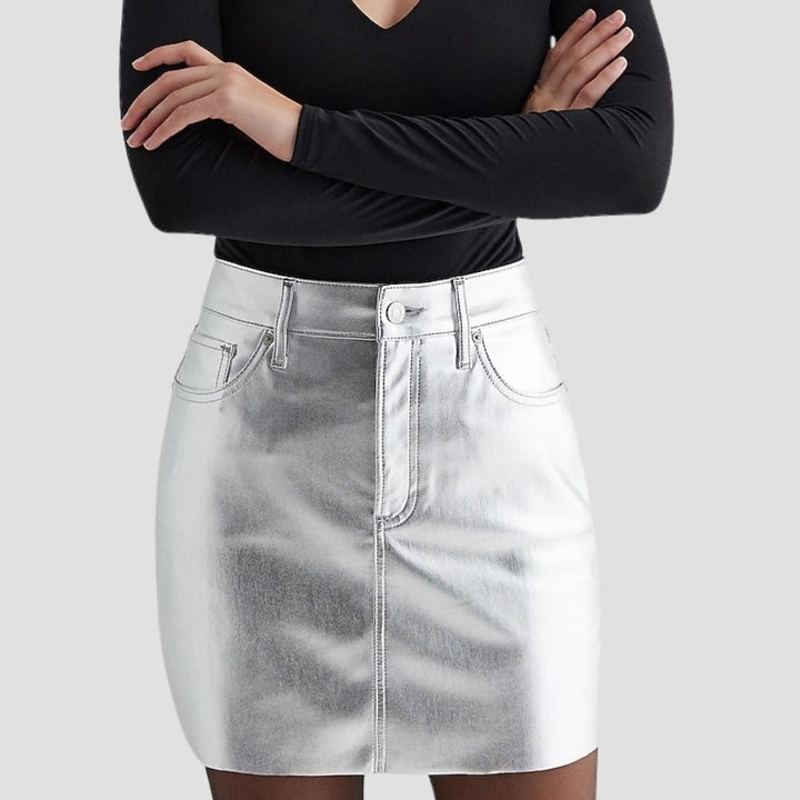 This elegant silver metallic skirt is perfect for those who love bold, modern fashion. A stylish, shimmering piece that enhances your wardrobe with luxurious shine.