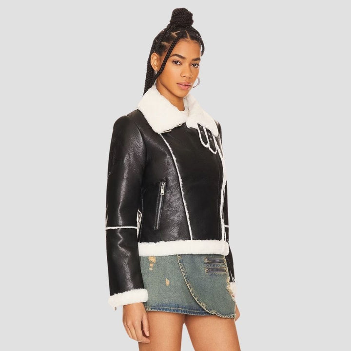 . This women’s fur leather jacket offers both comfort and style for cold weather fashion. With its fur lining and leather exterior, it’s perfect for versatile winter outfits.