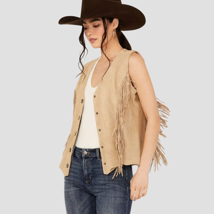Women’s fringe leather vest with rustic western aesthetics, crafted to enhance your wardrobe with a chic, boho flair.