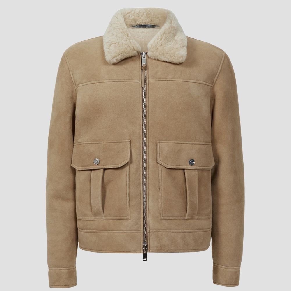 The perfect blend of rugged style and comfort, this men’s suede bomber jacket with curly fur lining is ideal for winter fashion.