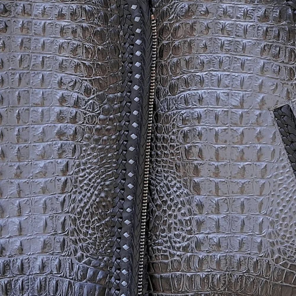 Stylish gray leather biker vest with crocodile texture and polyester lining.