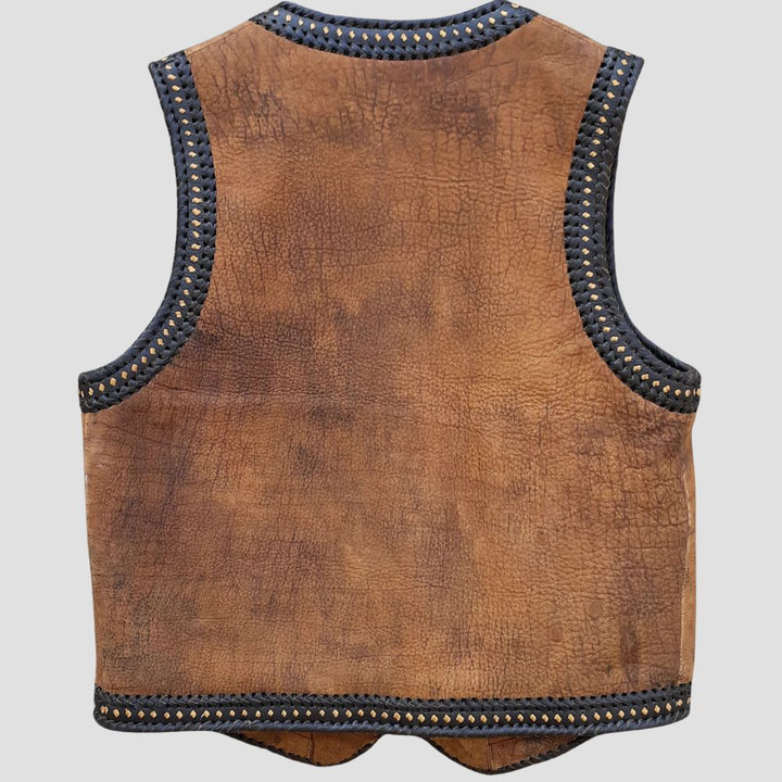 Rugged brown leather vest with polyester lining for motorcycle enthusiasts.