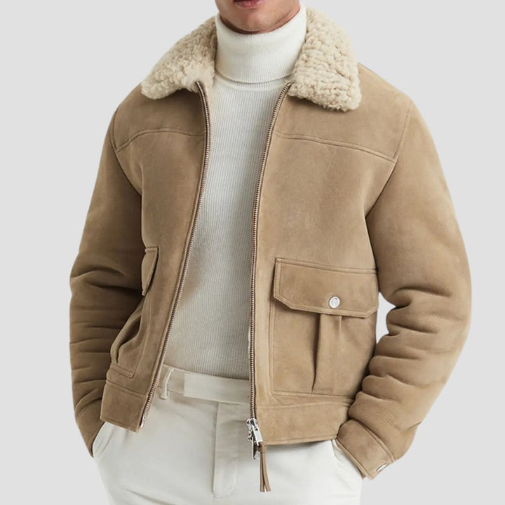 This suede leather bomber jacket for men combines timeless style with the cozy warmth of curly fur lining, perfect for colder days.