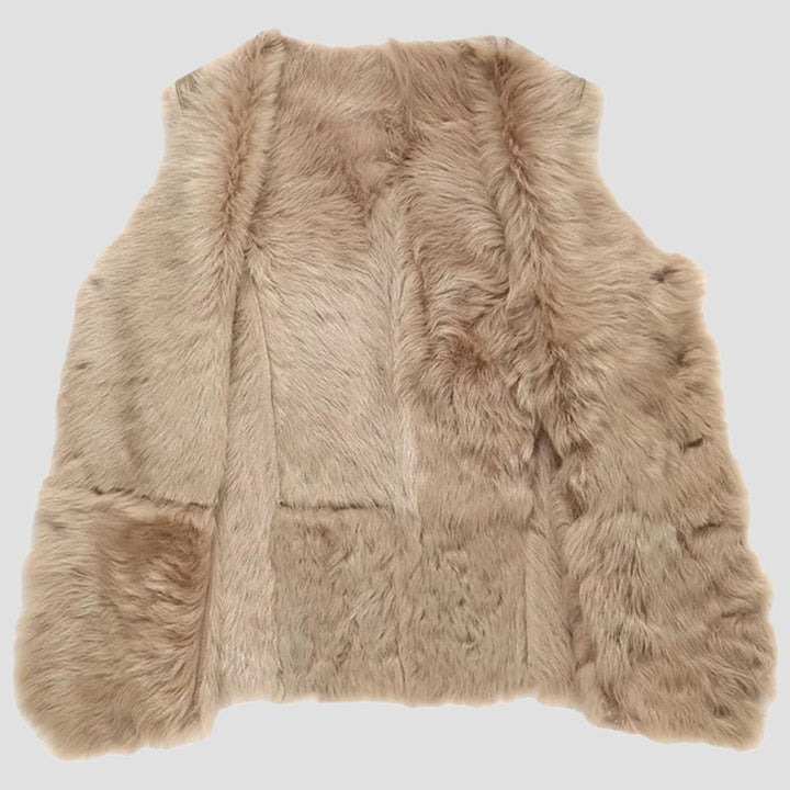 Stay stylish and cozy during the winter months with this durable and fashionable shearling leather vest.