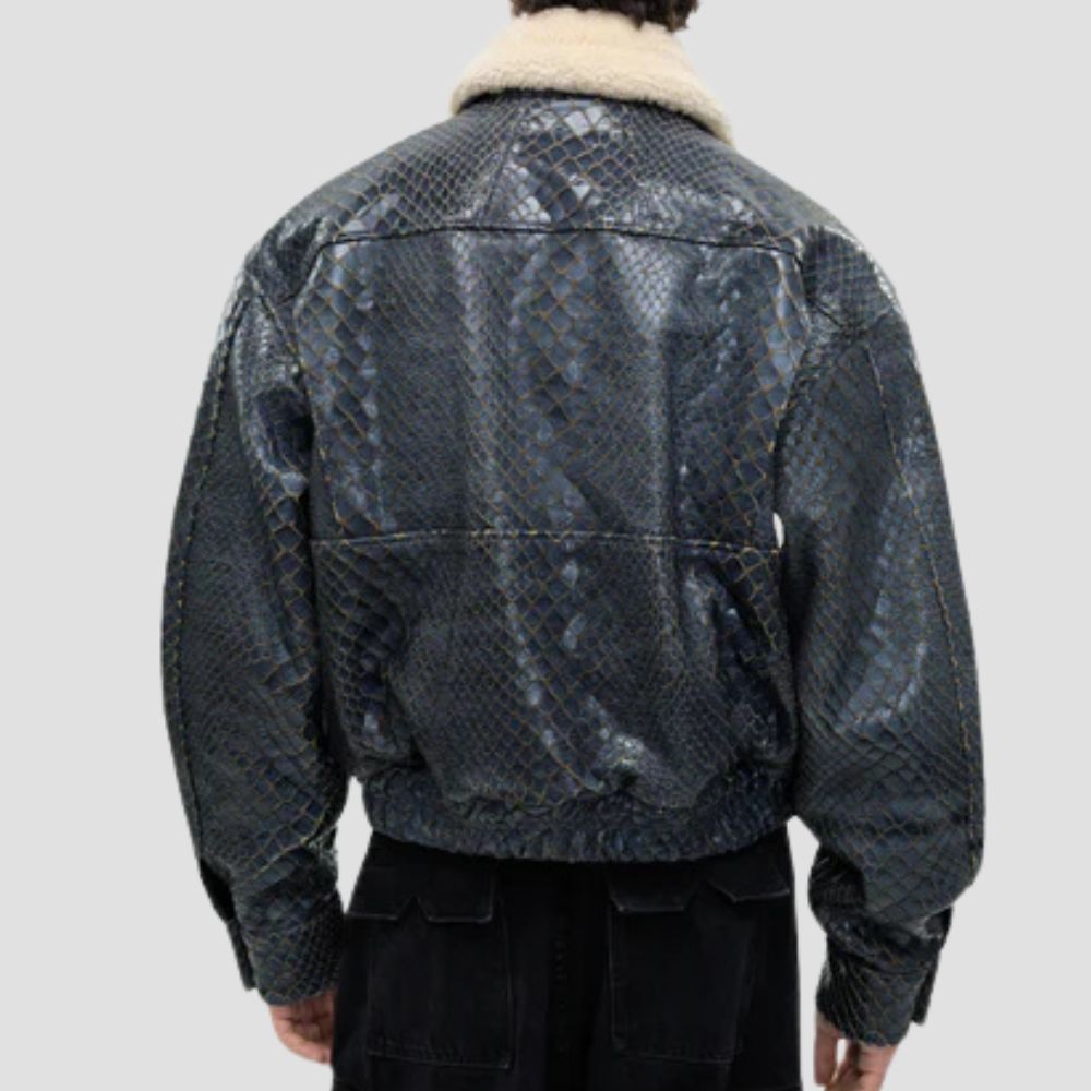 Step up your winter wardrobe with this trendy snakeskin jacket, complete with a warm and stylish fur collar.