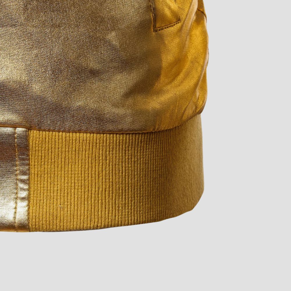 Elevate your wardrobe with this silver metallic jacket, the perfect fusion of edgy and contemporary urban fashion.