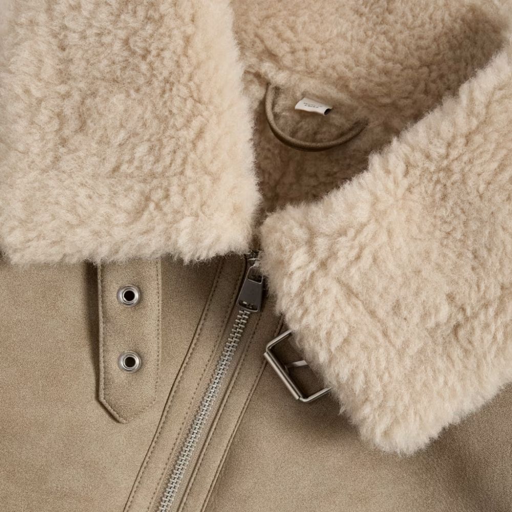 Take on outdoor adventures in style with this women’s Sherpa leather jacket. The Sherpa lining keeps you warm, while the leather exterior provides a fashionable edge.