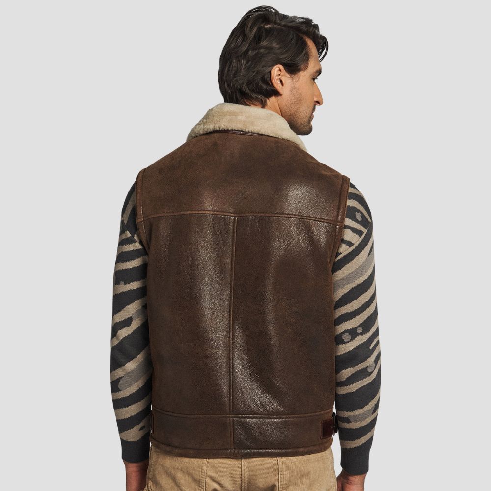 Stylish brown lambskin leather vest with cozy shearling fur lining.