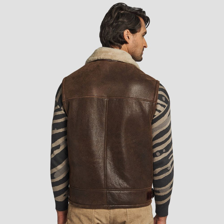 Stylish brown lambskin leather vest with cozy shearling fur lining.