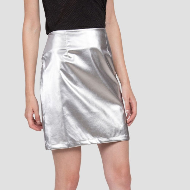 Trendy women’s leather metallic skirt, offering a bold fashion style and luxurious finish.