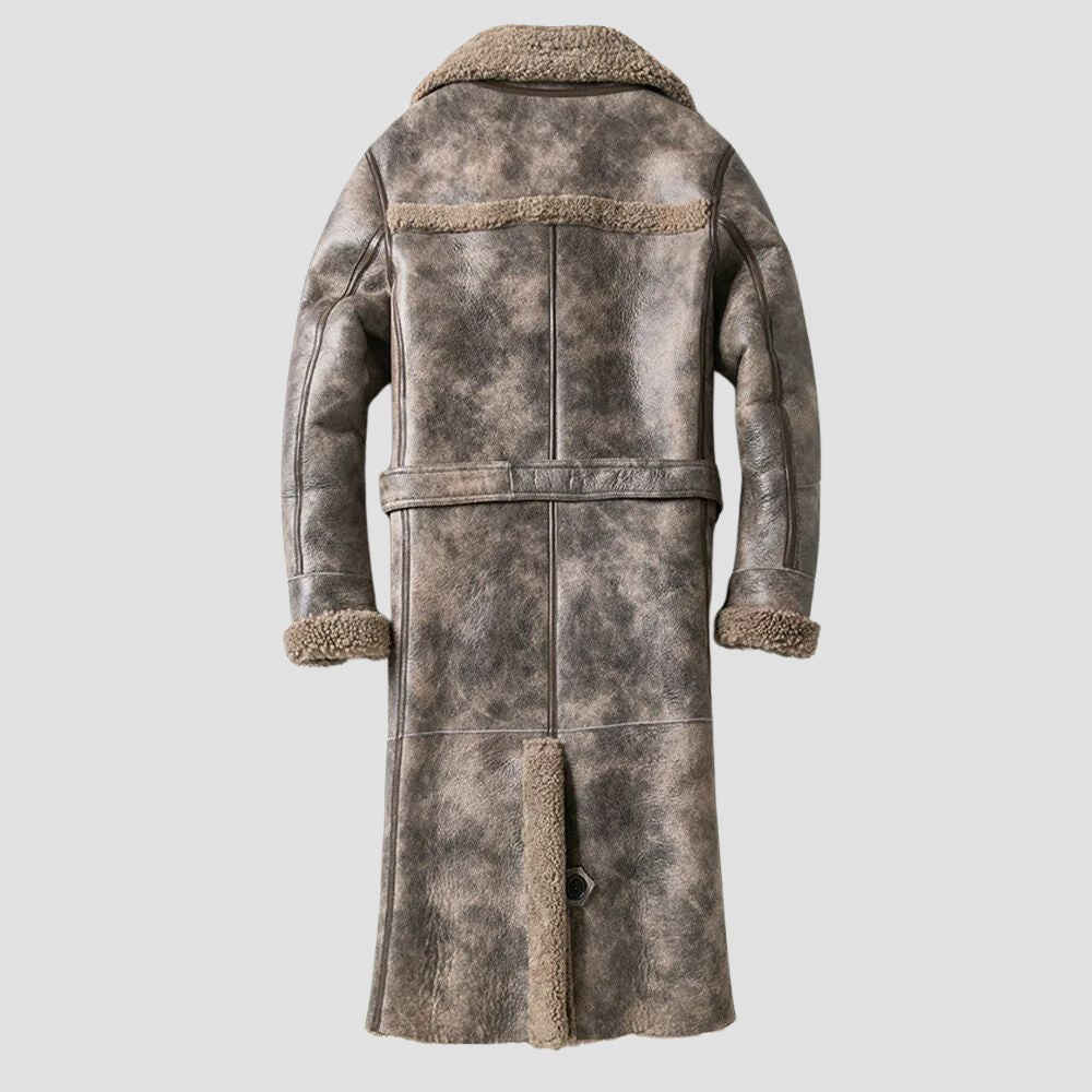 A timeless piece for men’s fashion, this brown leather trench is perfect for any occasion.