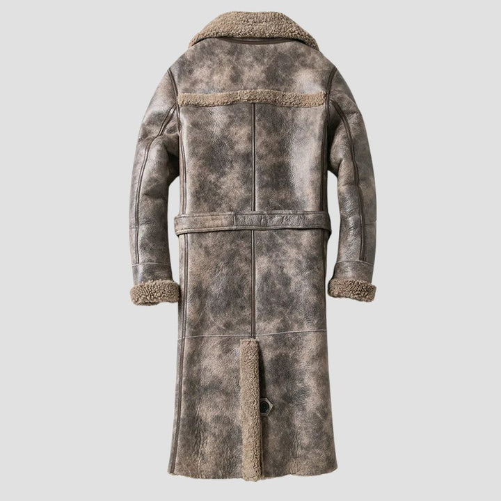 A timeless piece for men’s fashion, this brown leather trench is perfect for any occasion.
