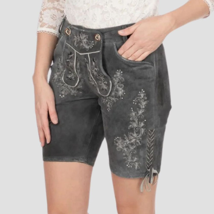 These premium women’s lederhosen feature beautiful embroidered floral designs, perfect for adding elegance and authenticity to your festival attire.