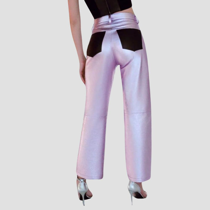 Stay trendy with these women’s metallic leather pants featuring a bold and reflective finish.