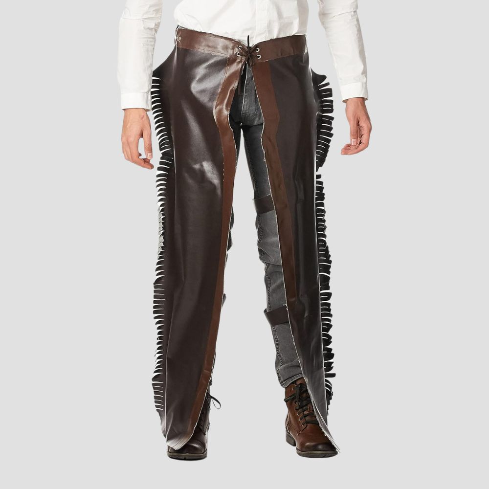 Perfect for ranch work or rodeo events, these premium fringe leather chaps embody timeless cowboy charm.