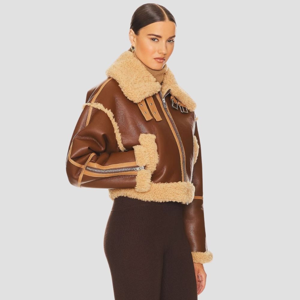 Elevate your cold weather wardrobe with this women’s B3 bomber leather jacket. Featuring warm shearling and sleek leather, it’s ideal for chic winter fashion.