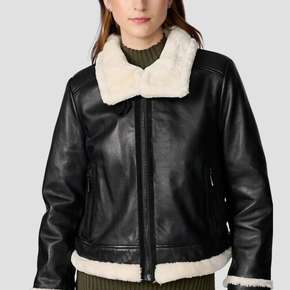  This women’s shearling leather jacket is perfect for winter-ready streetwear. The plush shearling and durable leather create a stylish yet functional look for cold weather.