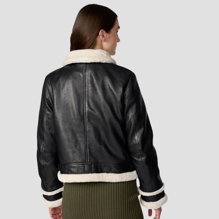 Shop this women’s shearling leather jacket for streetwear designed for winter. The combination of warm shearling and stylish leather ensures comfort and a fashionable look.