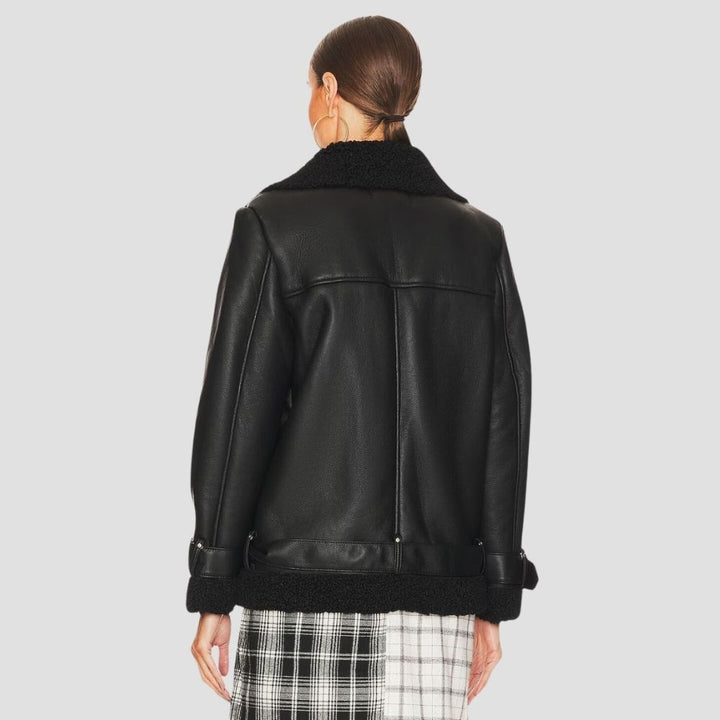 Stay warm and stylish in this women’s shearling leather jacket, designed for modern winter fashion. The combination of shearling and leather ensures both comfort and elegance.