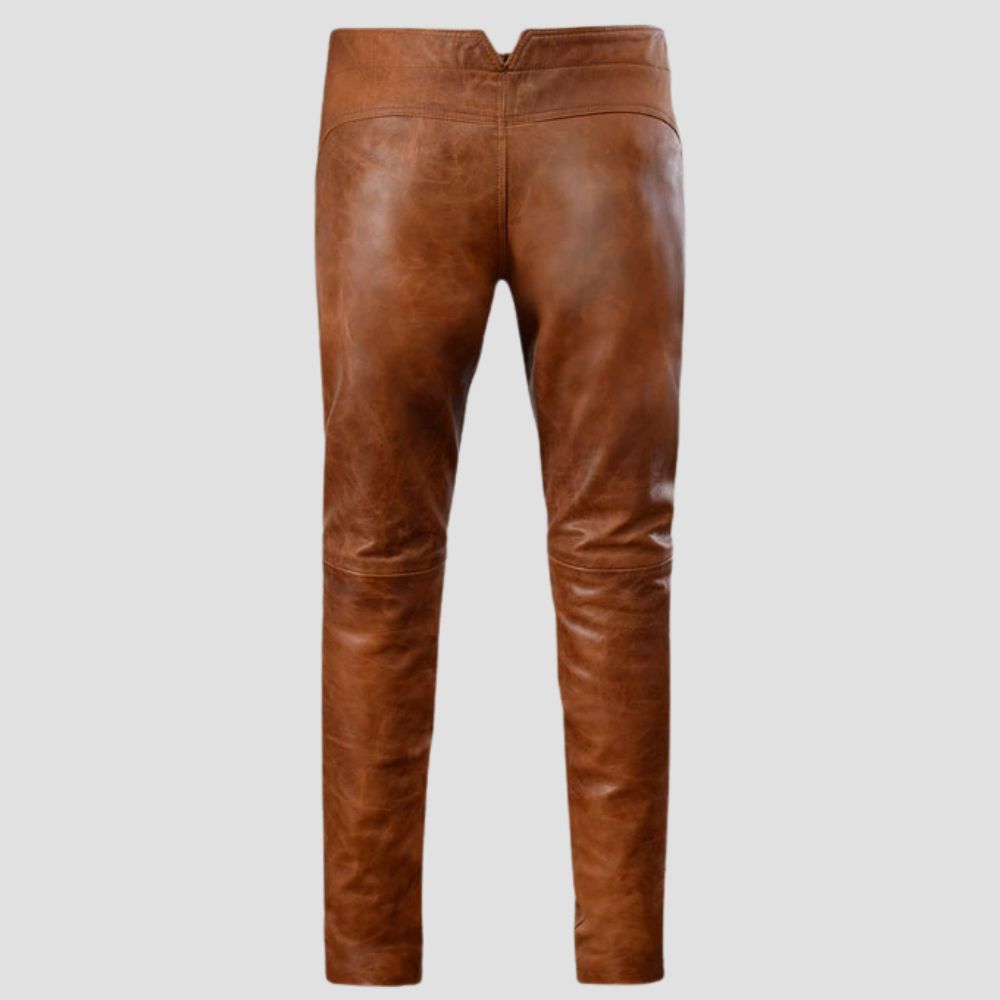 Casual wear brown distressed leather pants with a rugged look and sheepskin material.