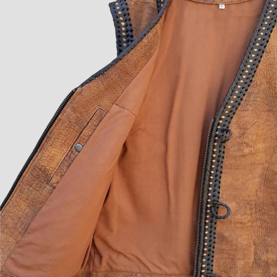 Classic brown biker vest made from durable distressed leather for riders.