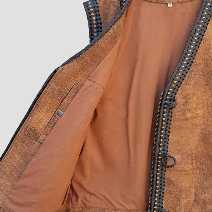 Classic brown biker vest made from durable distressed leather for riders.