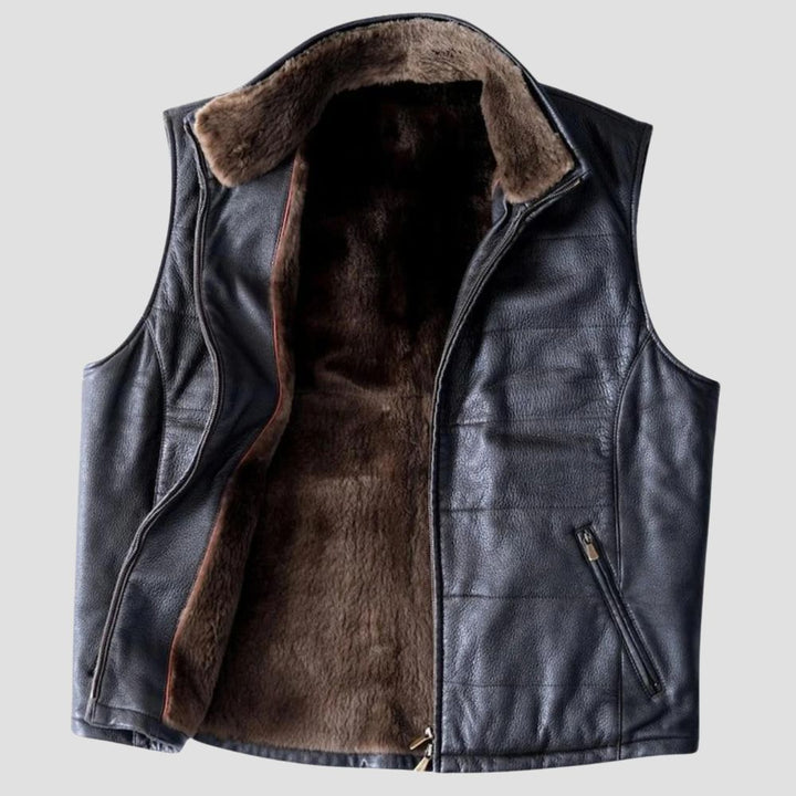 Stay warm and stylish with this premium black sheepskin leather vest featuring a soft fur lining.