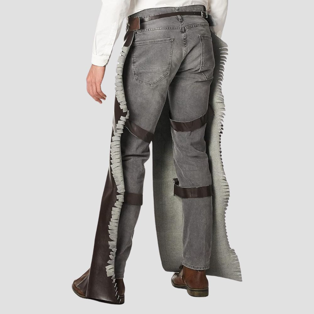 Ride in style with these durable and stylish fringe leather chaps, designed for rugged cowboy life.