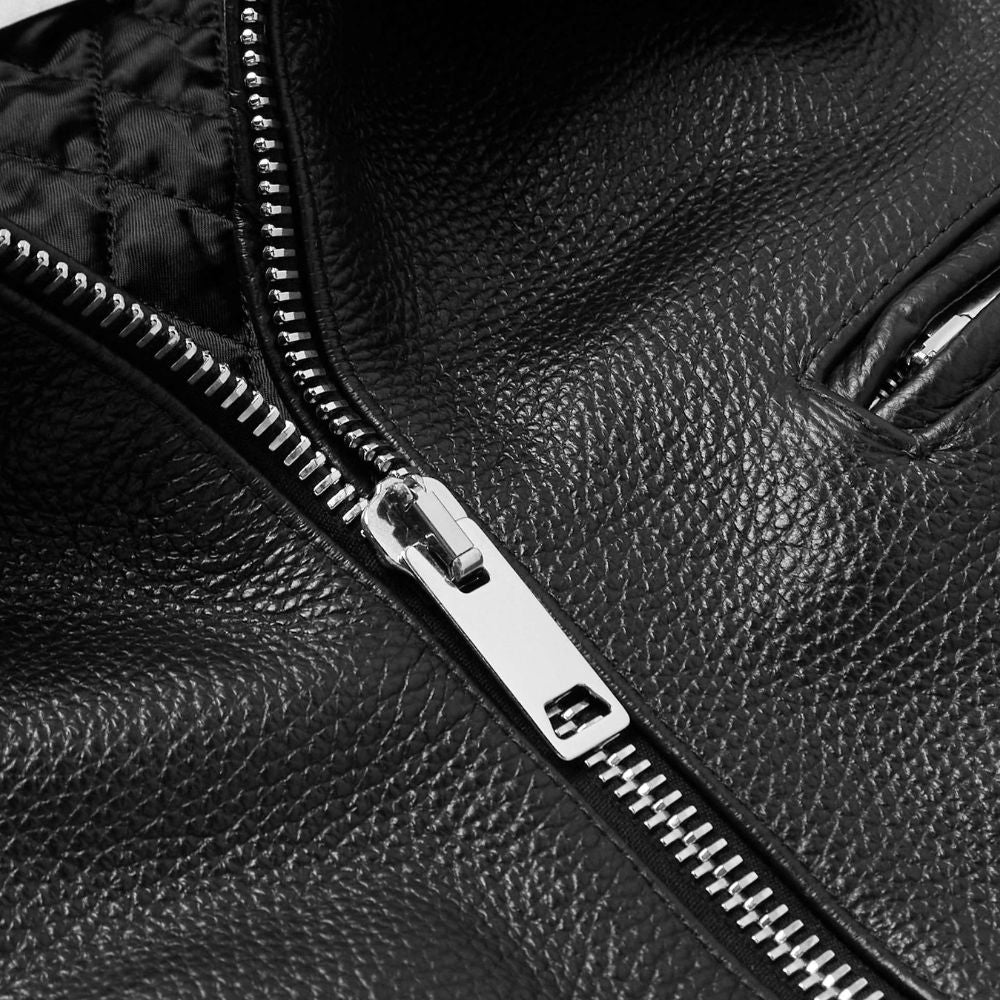 A must-have for any biker, this classic leather jacket brings a rugged yet stylish look to your motorcycle gear.
