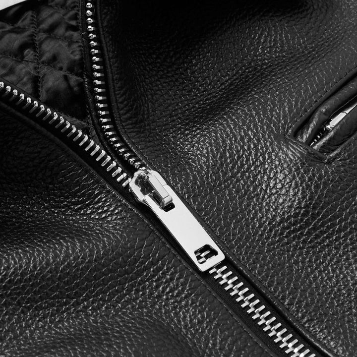 A must-have for any biker, this classic leather jacket brings a rugged yet stylish look to your motorcycle gear.
