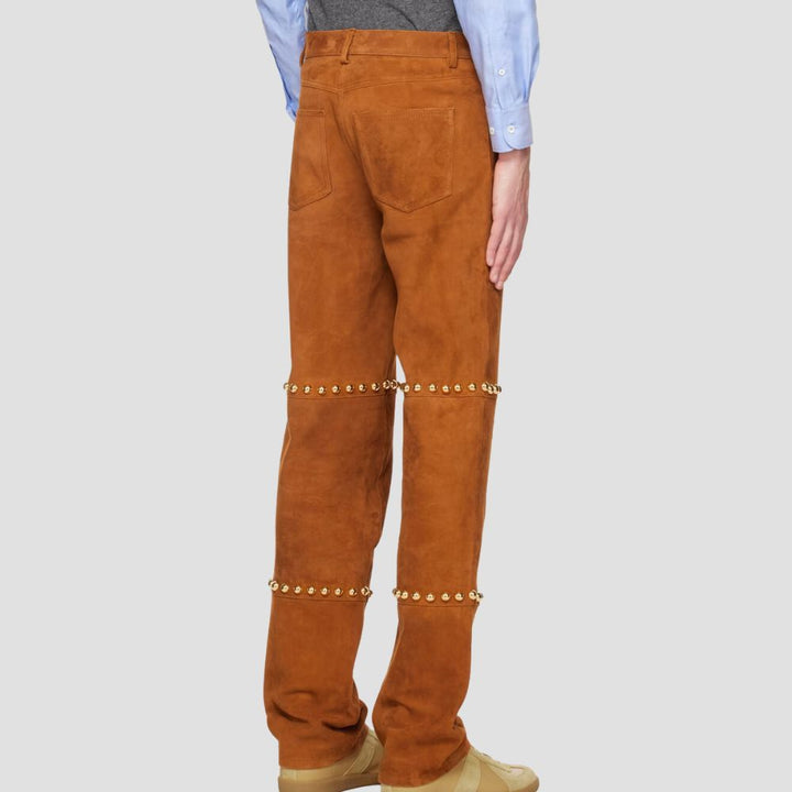 Premium suede leather pants with studded detailing for a fashion-forward look.