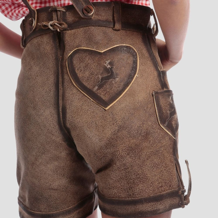  Enjoy a custom fit with these trendy women’s lederhosen, designed with an adjustable waistband. Perfect for adding comfort and style to your festive outfit.

