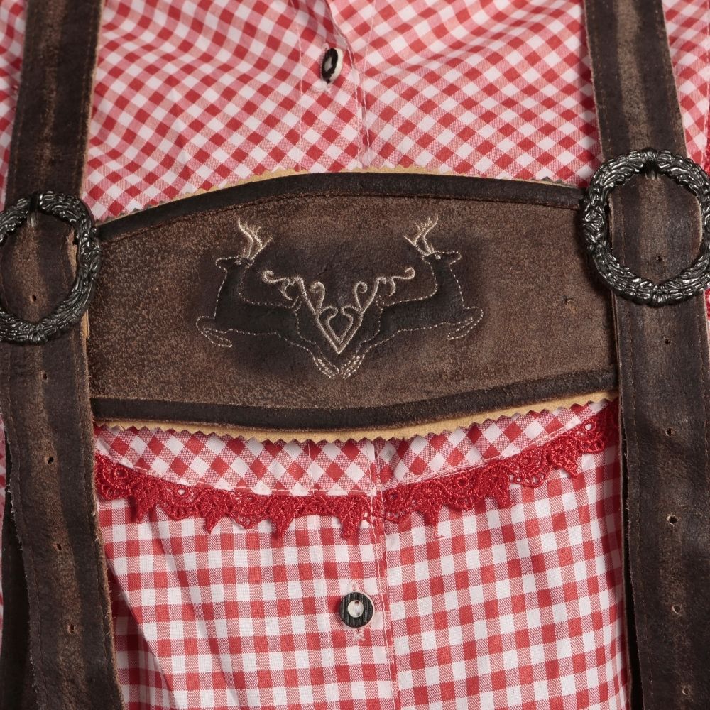 These trendy women’s lederhosen feature an adjustable waistband, offering a perfect fit for all-day comfort while celebrating cultural events in style.
