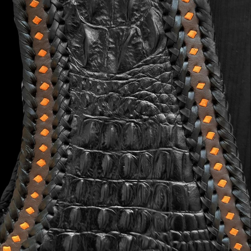 Unique crocodile embossed biker vest in black cowhide leather with polyester lining.
