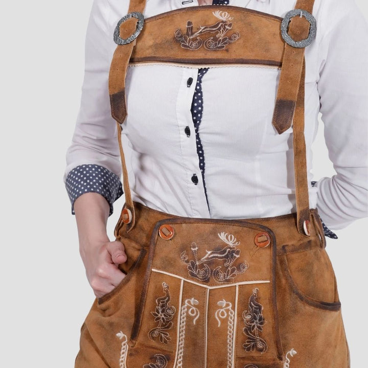 These authentic women’s lederhosen feature side laces, offering a customizable fit. Perfect for festivals and cultural events, combining tradition and comfort.